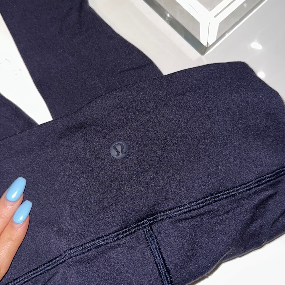 Lululemon leggings. Size 2. Hole details on side
